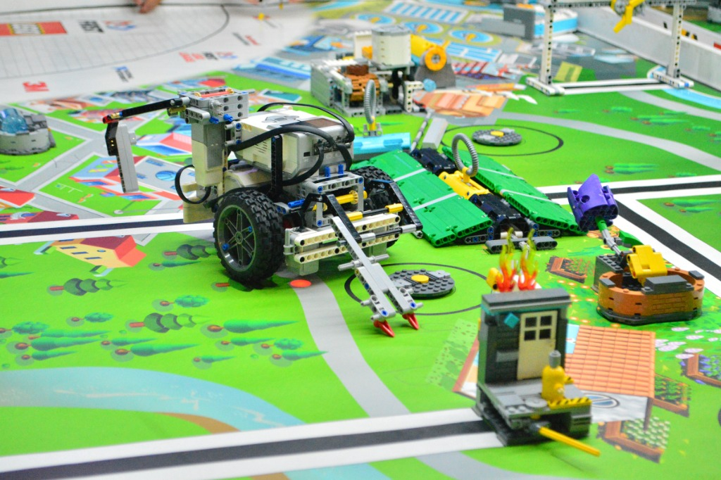Lego Mindstorms machine on a track