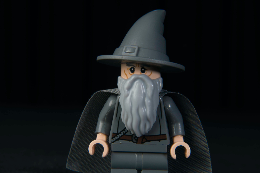 A lego person dressed as a wizard