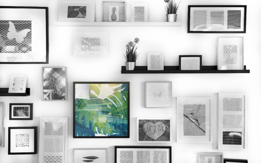 pictures hanging on a wall, one is highlighted