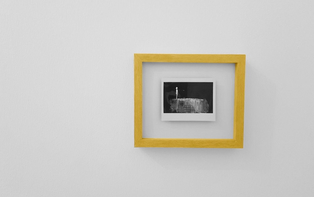 a framed picture. the frame is highlighted