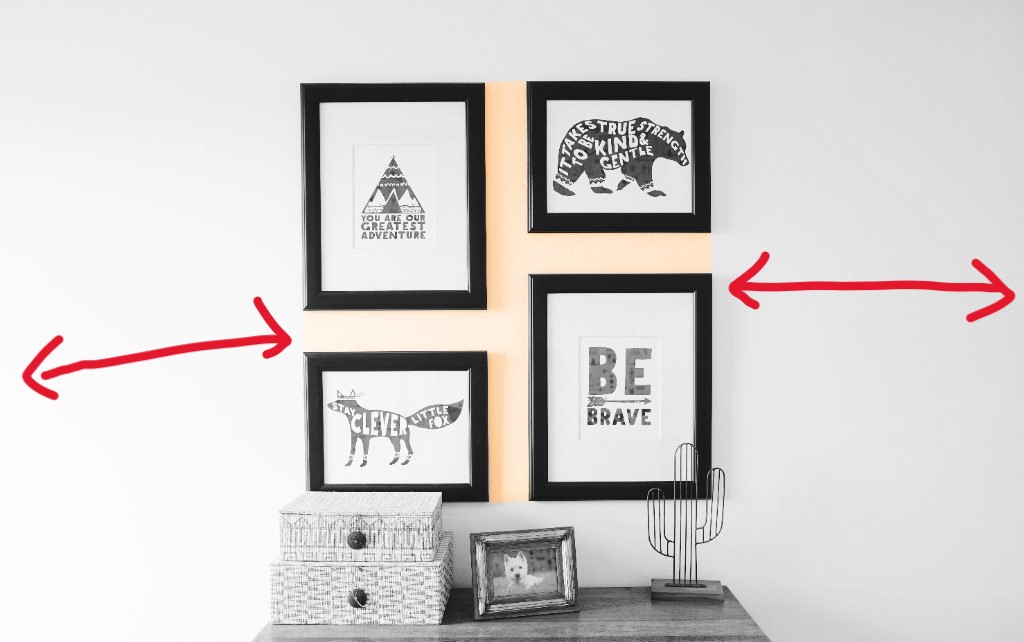 pictures hanging on wall. the wall is highlighted 