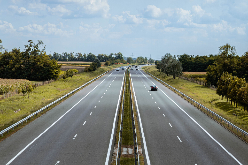 A fourlane motorway with medium traffic