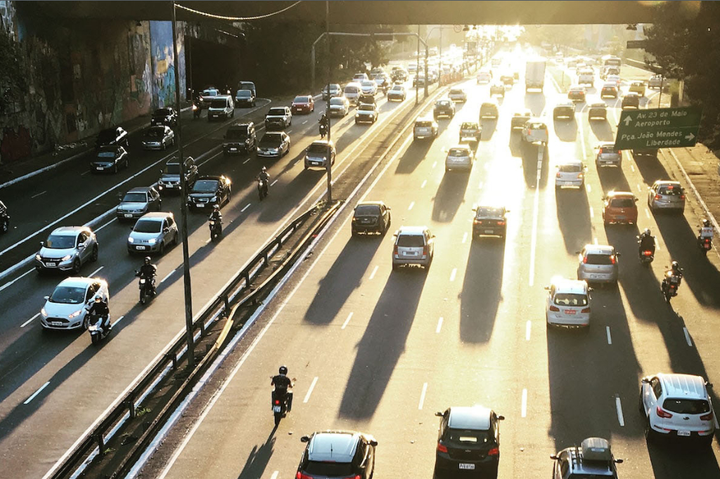 A 12 lane highway with heavy traffic