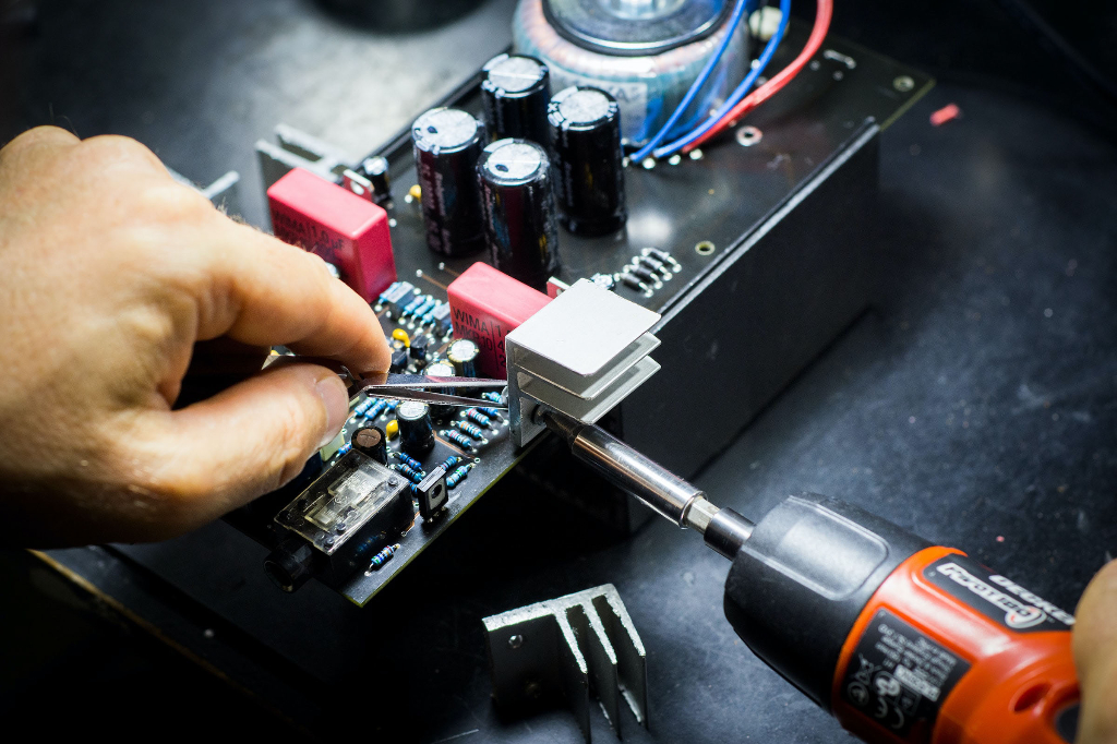 A drill being used on a computer chip
